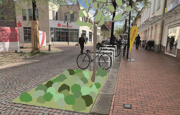 Fotomontage von der Großen Straße in Höhe der neuen Sparkasse. Zu sehen ist ein Stück Grünfläche, das einen Parkplatz ersetzt.